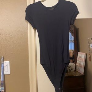 Navy blue, open back body suit.